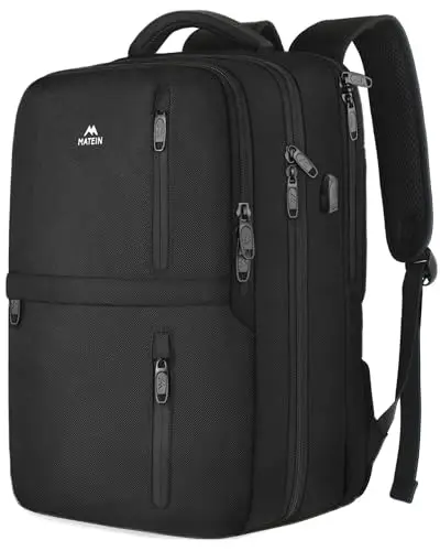 Black MATEIN travel backpack with USB port and under airplane seat