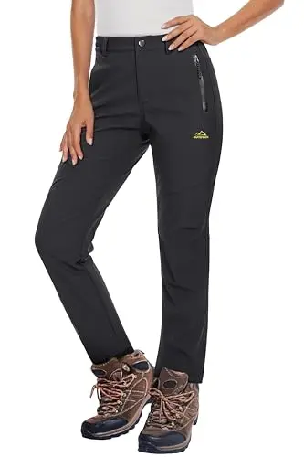 MAGCOMSEN women's black fleece-lined waterproof softshell pants for hiking and snow sports.