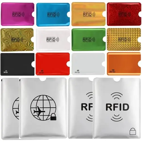 Schembo RFID blocking sleeves set with 12 colorful credit card sleeves and 4 passport protectors laid out.