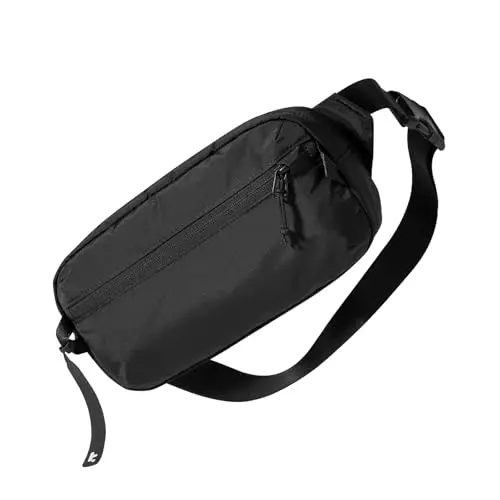 tomtoc black sling bag showing front zippers and adjustable strap worn across the chest