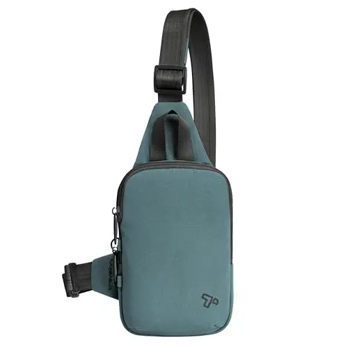 Travelon Voyages Compact Sling in a modern color, worn on the back