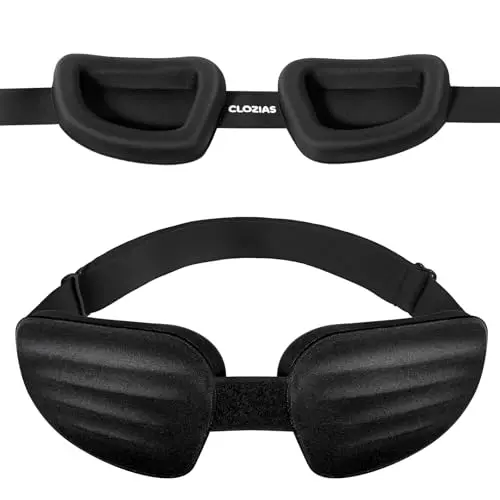 CLOZIA black sleep mask with contoured cups, shown with its storage pouch.